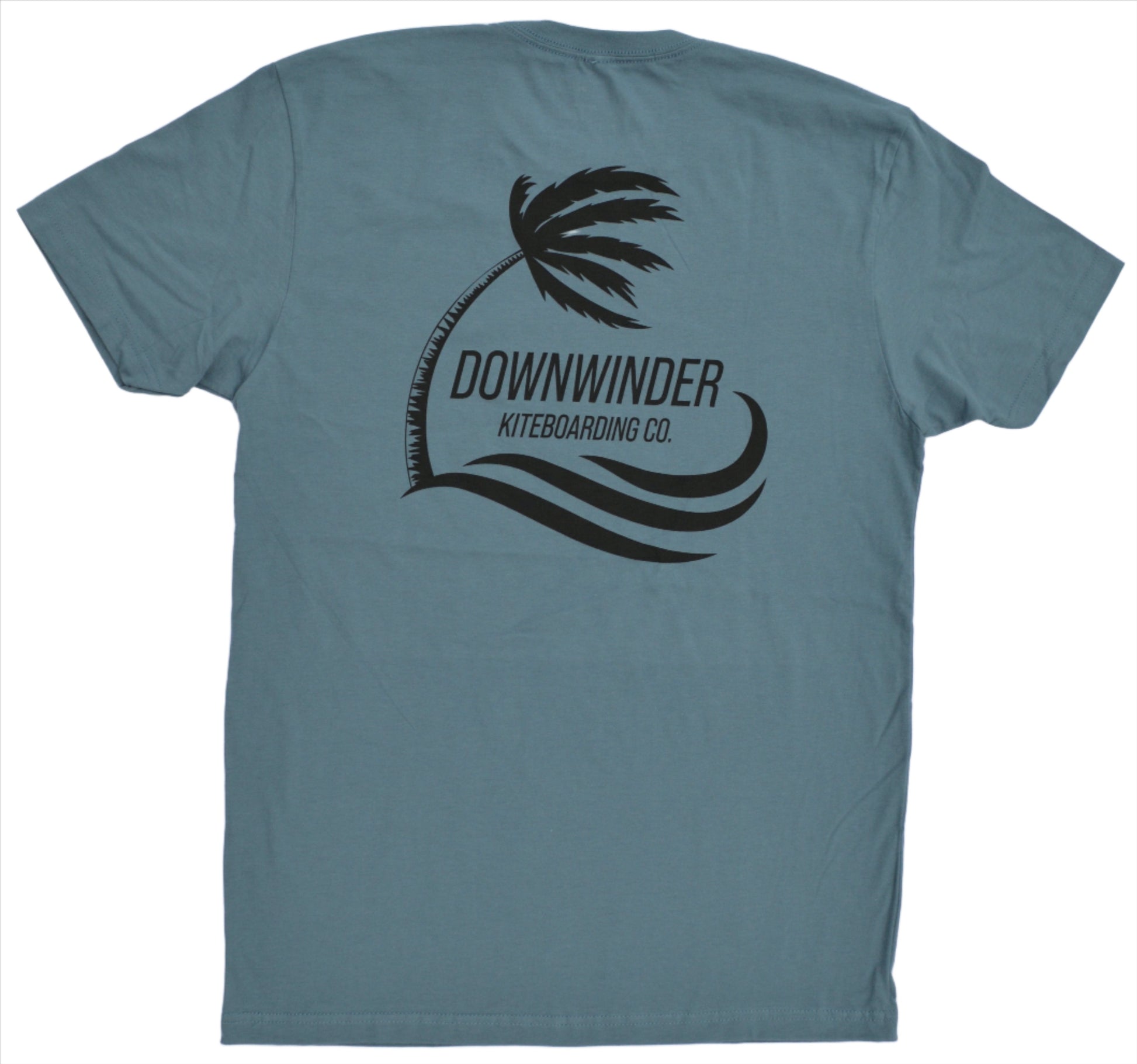 The back of the blue jean color Downwinder Kiteboarding Co. logo tee shirt. The logo shows a palm tree blowing over with waves below it. Text says "Downwinder Kiteboarding Co."
