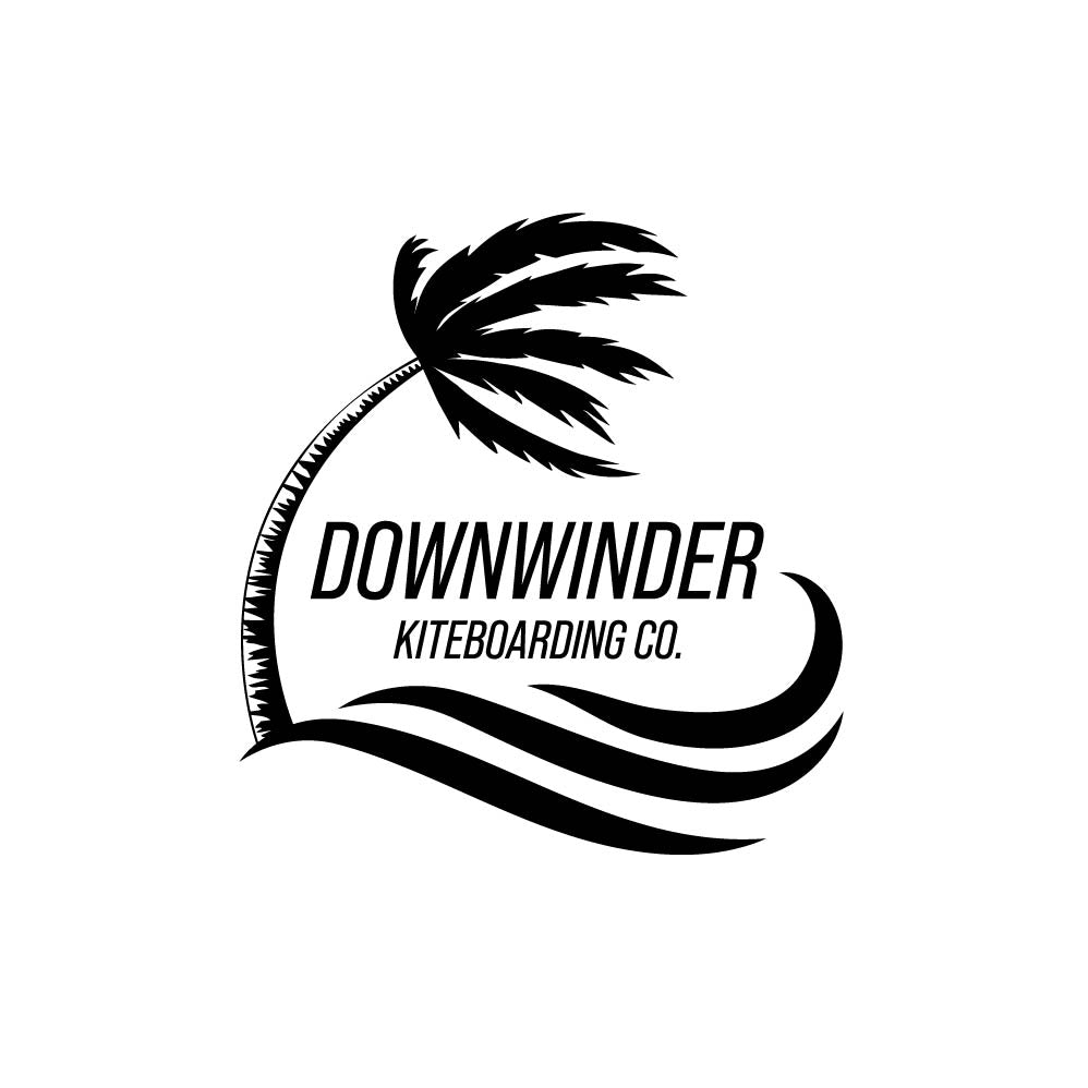 Close up of Downwinder Kiteboarding Co. logo. The logo shows a palm tree blowing over with waves below it. Text says "Downwinder Kiteboarding Co."