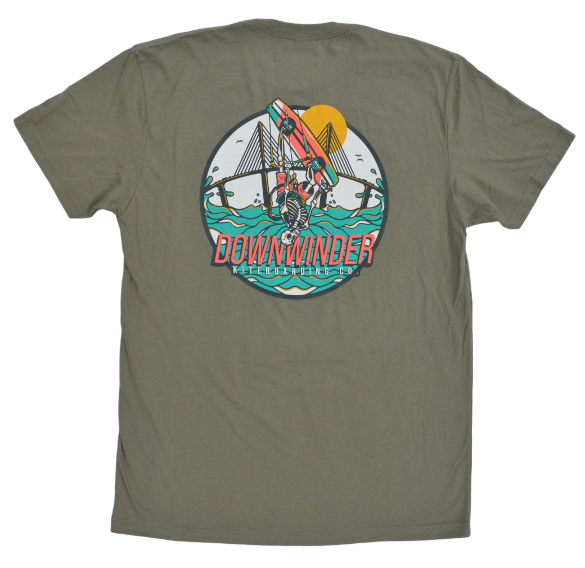 Light Grey Downwinder Kiteboarding Co. Skeleton Roll tee shirt. The Graphic on the back shows a skeleton doing a backroll in front of the Skyway Bridge