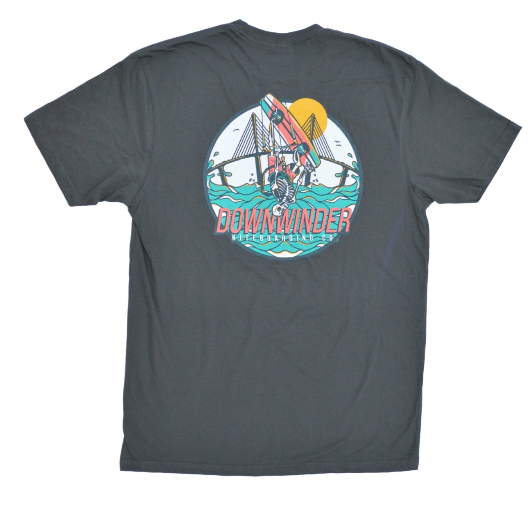 Dark Grey Downwinder Kiteboarding Co. Skeleton Roll tee shirt. The Graphic on the back shows a skeleton doing a backroll in front of the Skyway Bridge